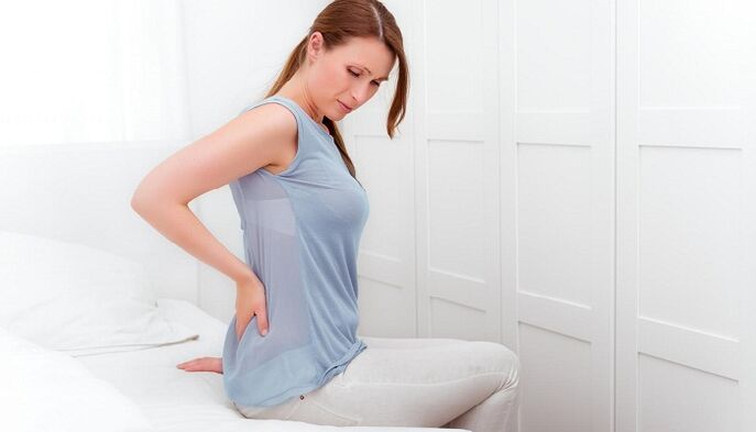 A woman worries about back pain